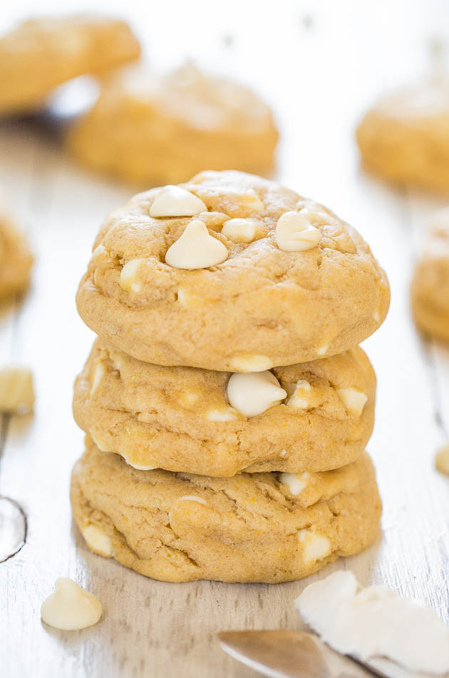 three Cream Cheese White Chocolate Chip Cookies stacked atop each other