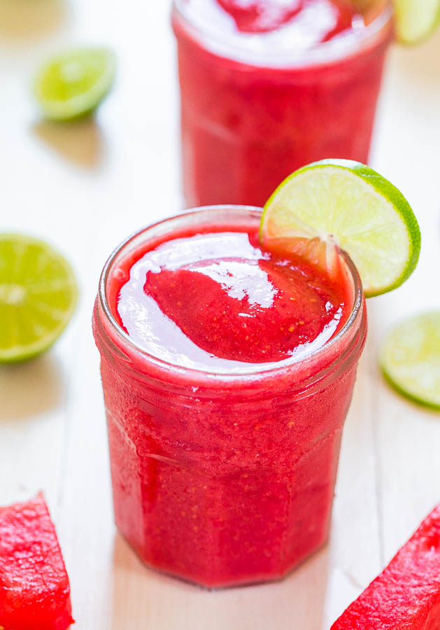 Watermelon Vodka Slush — These alcoholic slushies are summertime in a glass! Cool, refreshing, and you'll want a refill before you know it!
