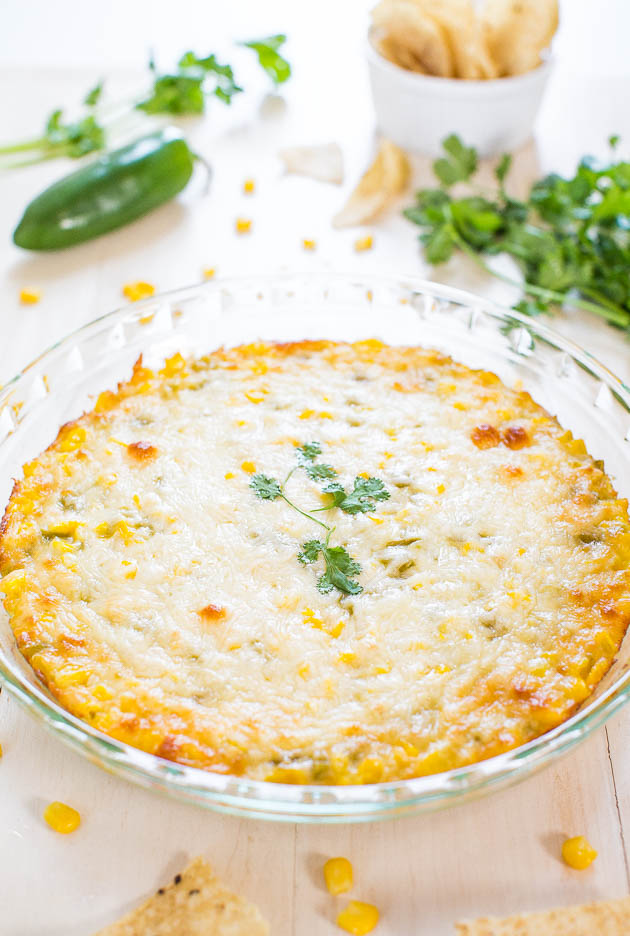 Hot Cheesy Corn Dip - Two kinds of cheese, corn and green chiles make for an irresistible dip! Easy comfort food that'll be devoured!!