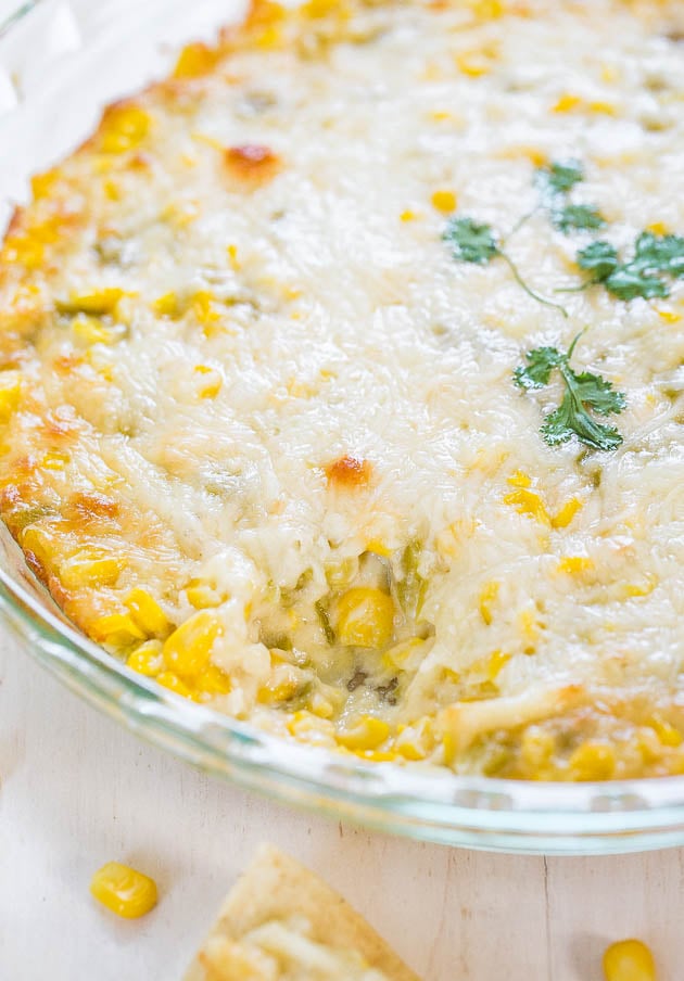 Hot Cheesy Corn Dip - Two kinds of cheese, corn and green chiles make for an irresistible dip! Easy comfort food that'll be devoured!!