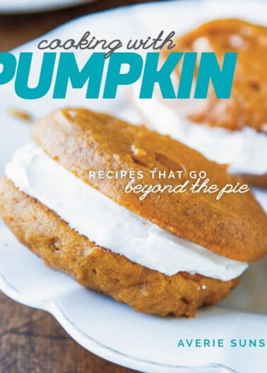 Pumpkin-flavored whoopie pies featured on the cover of 'cooking with pumpkin' recipe book by averie sunshine.