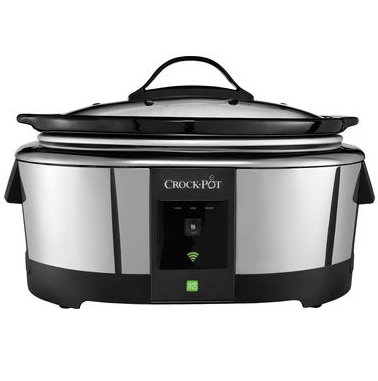 Stainless steel slow cooker with a digital interface and a black lid.
