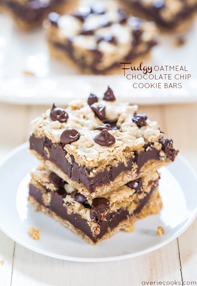 Fudgy Oatmeal Chocolate Chip Bars — Chewy oatmeal cookie bars with a thick layer of fudge in the middle! Whoa, hello chocolate overload!!