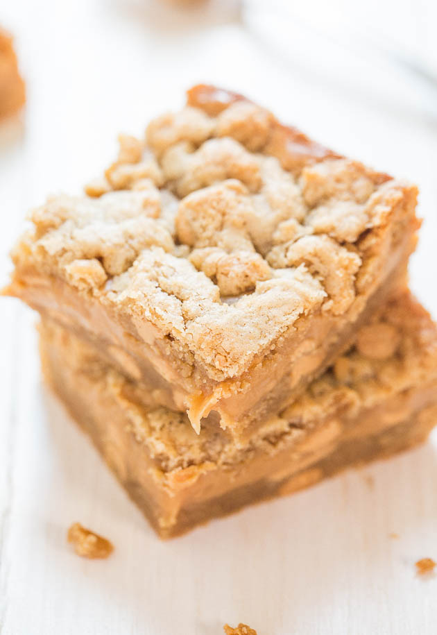 Peanut Butter Sandwich Cookie Bars - A creamy PB layer sandwiched between PB cookie dough! Peanut butter lovers will go nuts over these!!