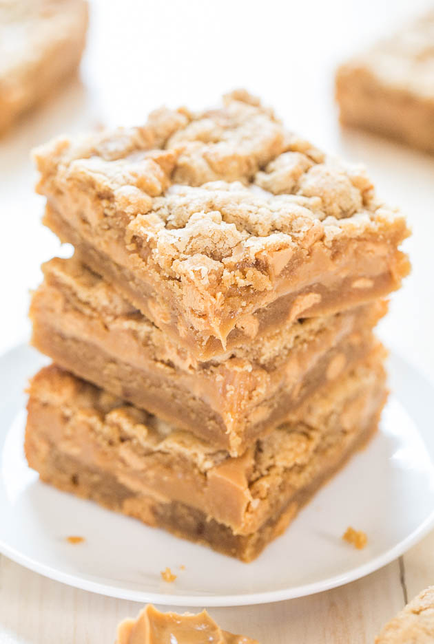 Peanut Butter Sandwich Cookie Bars - A creamy PB layer sandwiched between PB cookie dough! Peanut butter lovers will go nuts over these!!
