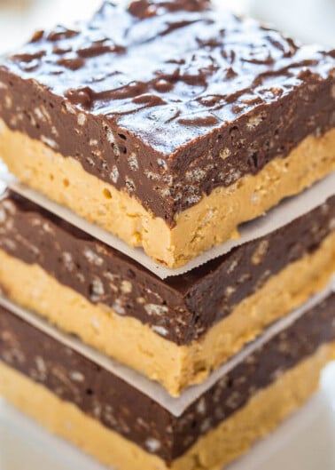 A stack of three chocolate-frosted crispy rice treats.