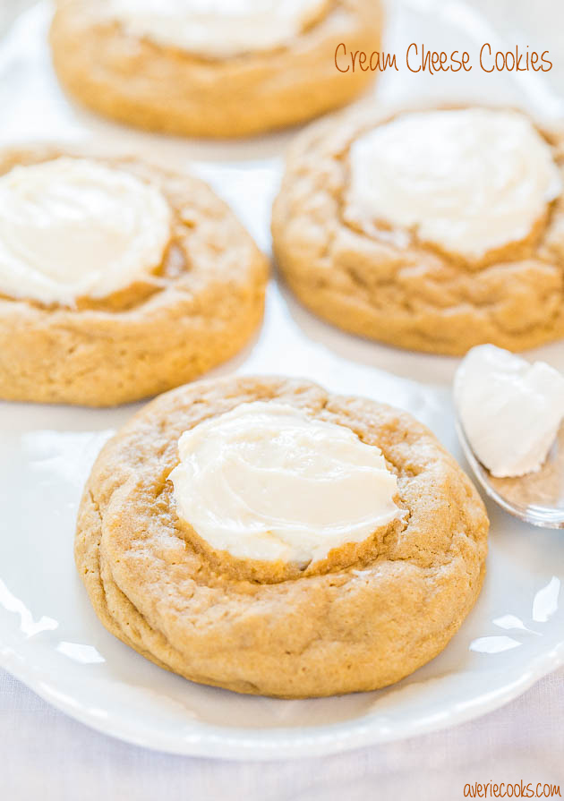 four cream cheese cookies on a white platter 