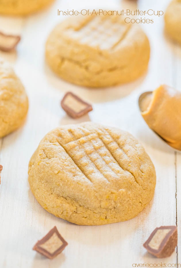 soft peanut butter cookies surrounded by halved PB cups