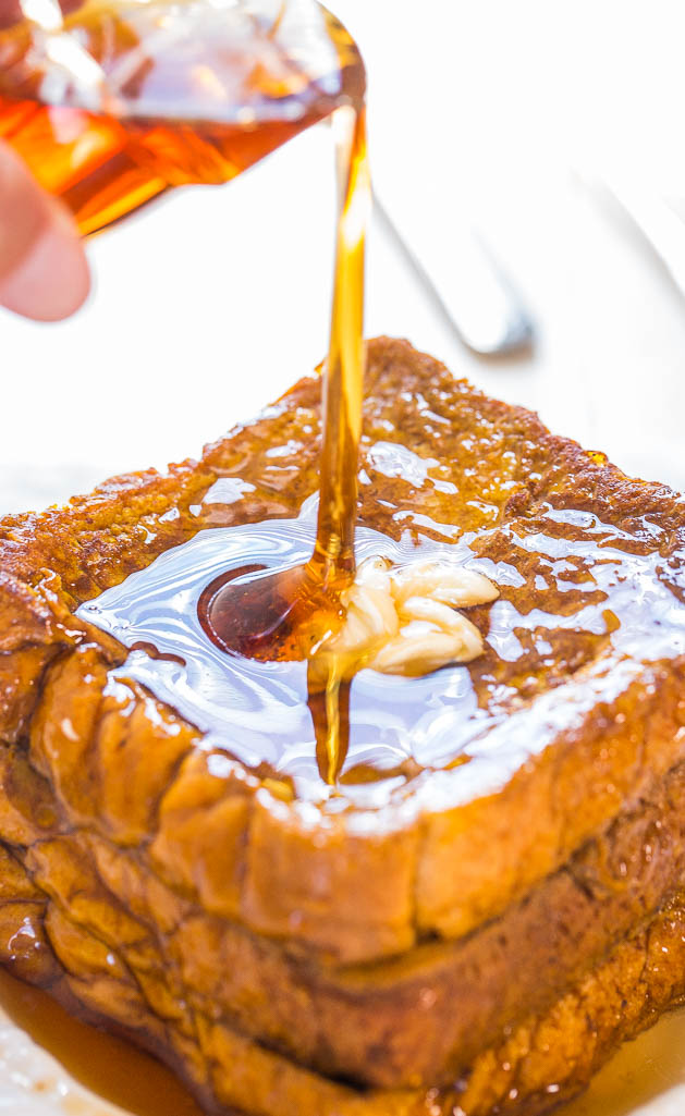 pouring maple syrup onto Pumpkin French Toast 