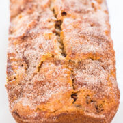 Close-up of a cinnamon sugar-dusted loaf of bread.