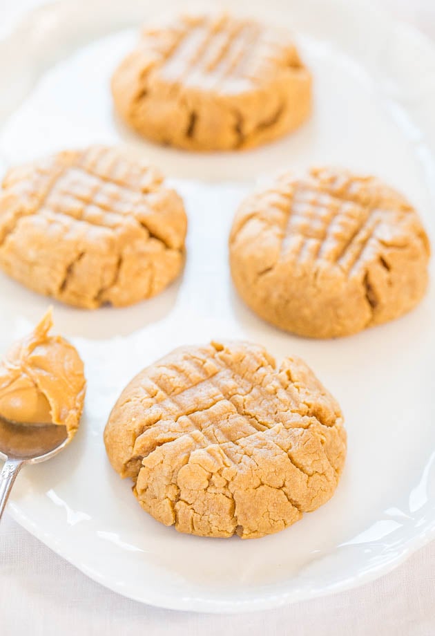 Easy 4-Ingredient Perfect Peanut Butter Cookies - Soft, chewy, and made with an ingredient you'd never guess! It works and they're perfect!!