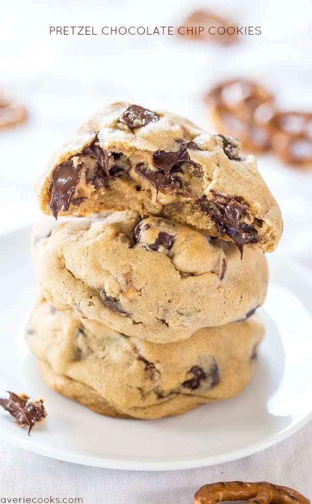 stack of three chocolate chip pretzel cookies on a white plate 