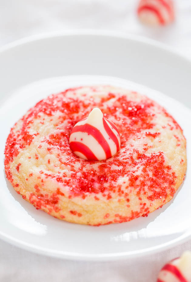 Candy Cane Blossom Sugar Cookies - Soft, chewy, and so easy!! The sprinkles make them totally irresistible! Santa's going to love these!!