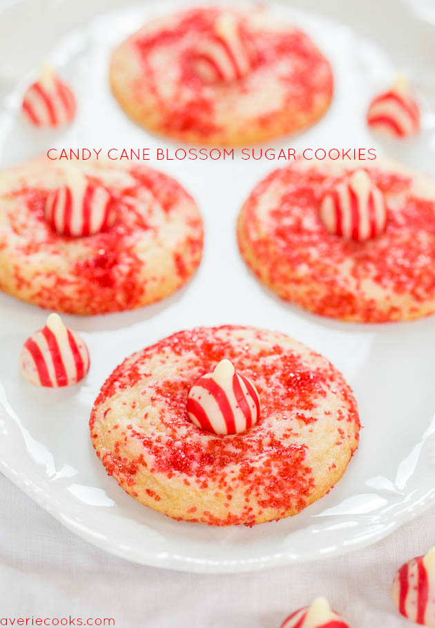 Candy Cane Blossom Sugar Cookies - Soft, chewy, and so easy!! The sprinkles make them totally irresistible! Santa's going to love these!!