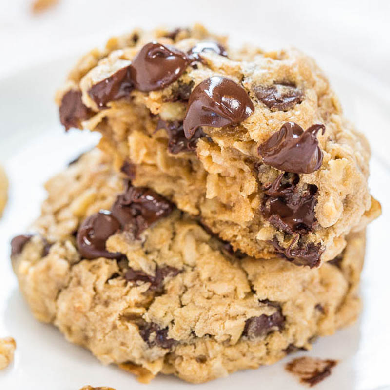 A stack of homemade chocolate chip cookies on a plate.