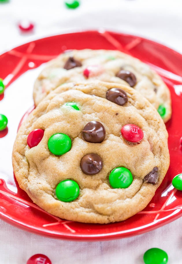 two M&M's Christmas cookies on a red plate 