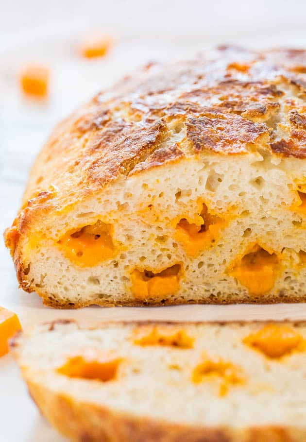 Easy Cheddar Sourdough - No starter required and so easy! It tastes like it's from a fancy bakery! Who can resist homemade cheesy bread!!