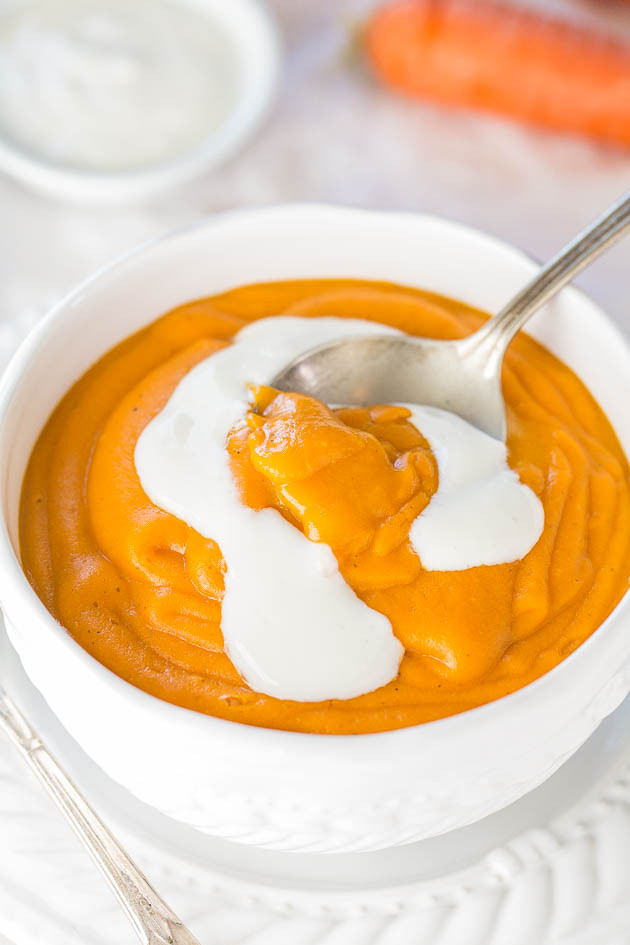 Skinny Carrot Potato Soup with Honey Cream - Healthy, hearty, fast, and easy! Packed with flavor and you'll never miss the fat and calories!