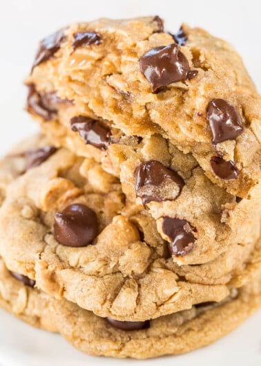 Stack of chocolate chip cookies on a white background.