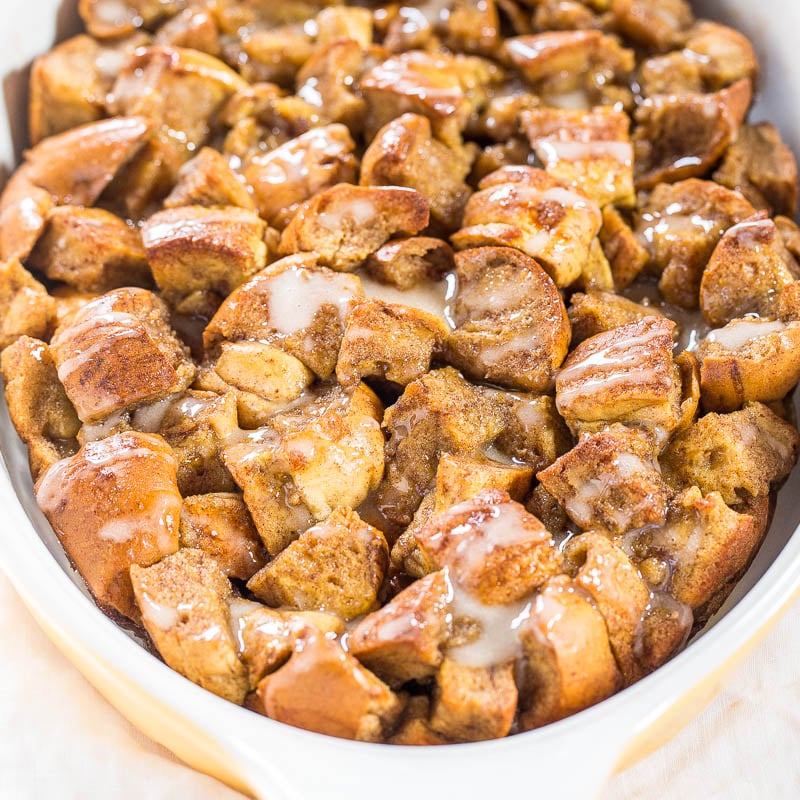 A dish of freshly baked cinnamon monkey bread with glaze.