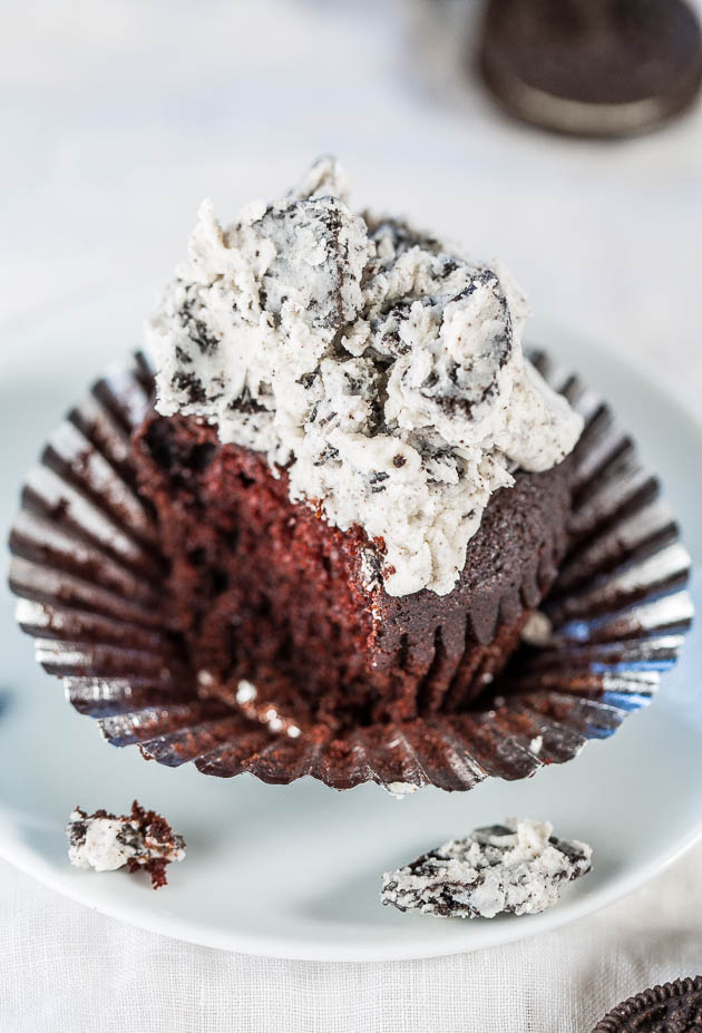 Cookies and Cream Cupcakes — Soft, fluffy chocolate cupcakes with Oreo frosting you'll want to eat by the spoonful! Ready in under an hour, and perfect for birthdays, parties, and family gatherings! 