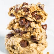 A close-up of a stack of homemade chocolate chip cookies.