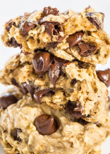 A close-up of a stack of homemade chocolate chip cookies.