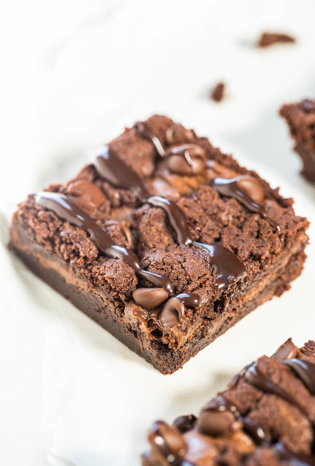 Fudgy Nutella Triple Chocolate Brownies - NO eggs, NO oil, NO gluten and you'll never miss them!!! Stuffed with Nutella, chocolate chips, and topped hot fudge! Fast, easy, and tastes amazing!!