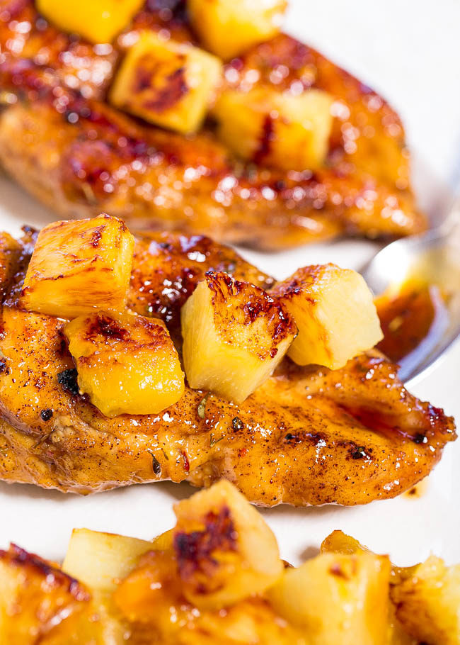 Sweet and Tangy Jerk Chicken with Caramelized Pineapple and Mango - Easy and ready in 15 minutes! Dinner that tastes like a tropical vacation is a guaranteed hit!!