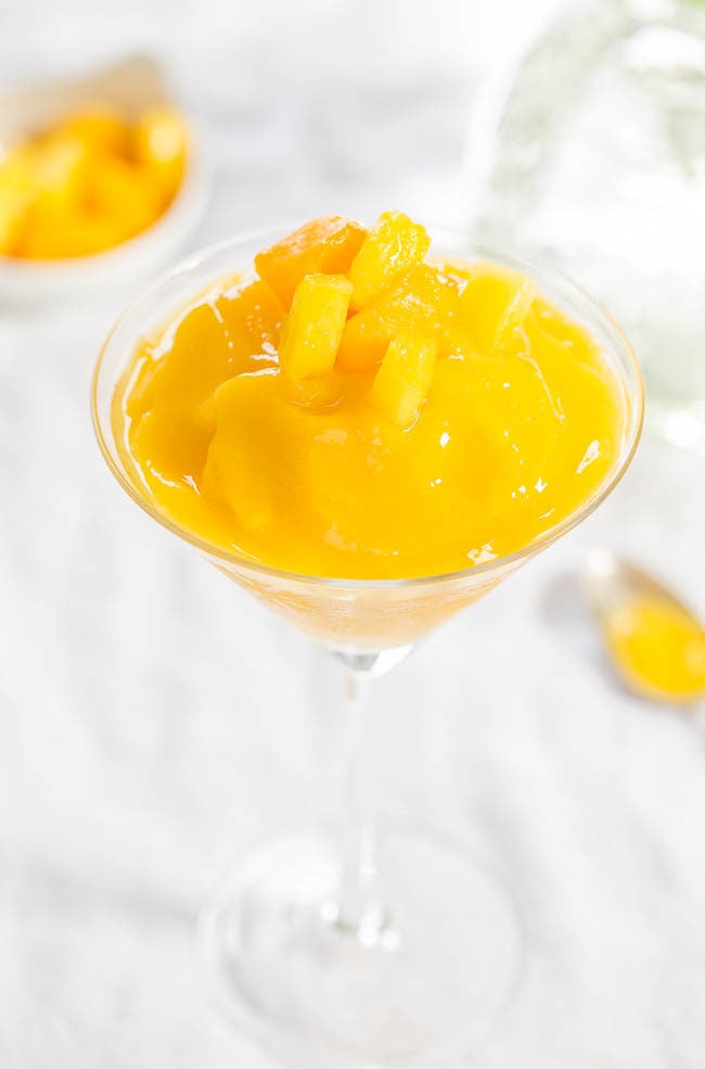 Mango Pineapple Frozen Margaritas - No margarita mix and no sugar needed for amazing, easy margaritas that are ready in 30 seconds!! Refills are a must!!