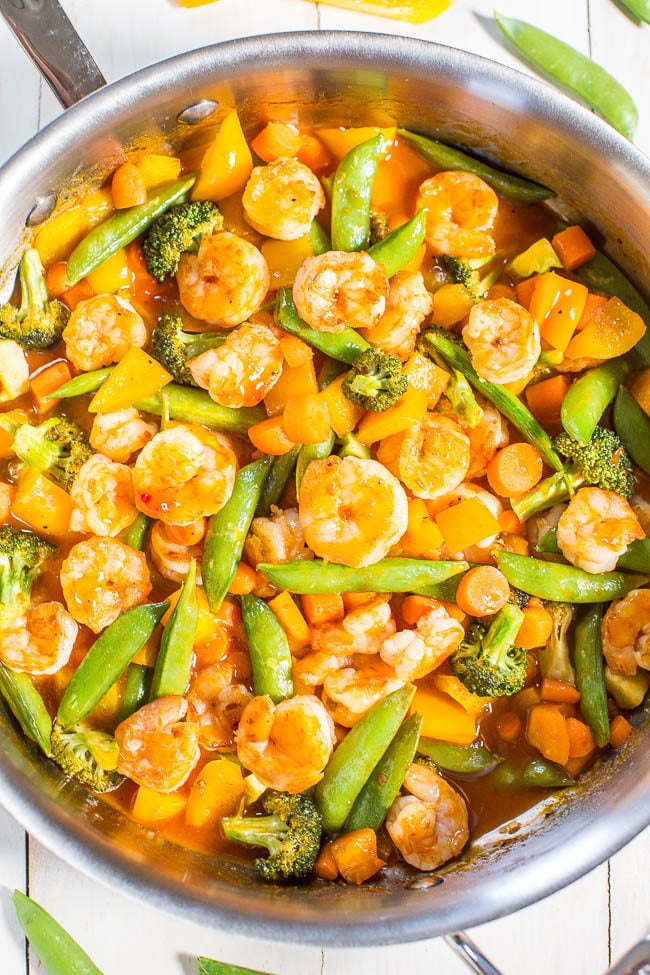 Sweet-and-Sour Shrimp and Vegetable Stir Fry - Big juicy shrimp and crunchy veggies coated in tangy sauce are a hit with everyone!! Easy, healthy, ready in 20 minutes, and way better than takeout!!