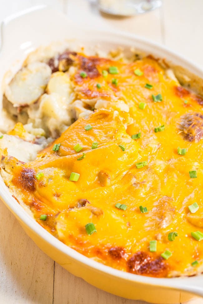 Cheesy Loaded Scalloped Potatoes in a yellow dish