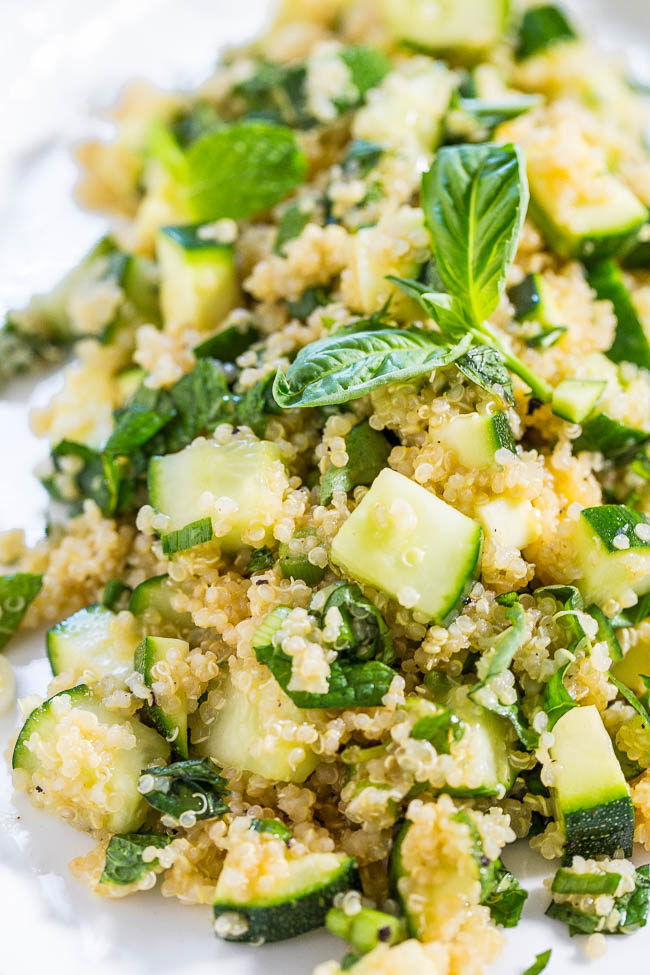 Favorite Greens Quinoa Salad - Cucumber, zucchini, basil, and mint tossed with a sweet-and-tangy honey-lemon vinaigrette! Healthy, easy, ready in 15 minutes, and the best way to eat your greens!!