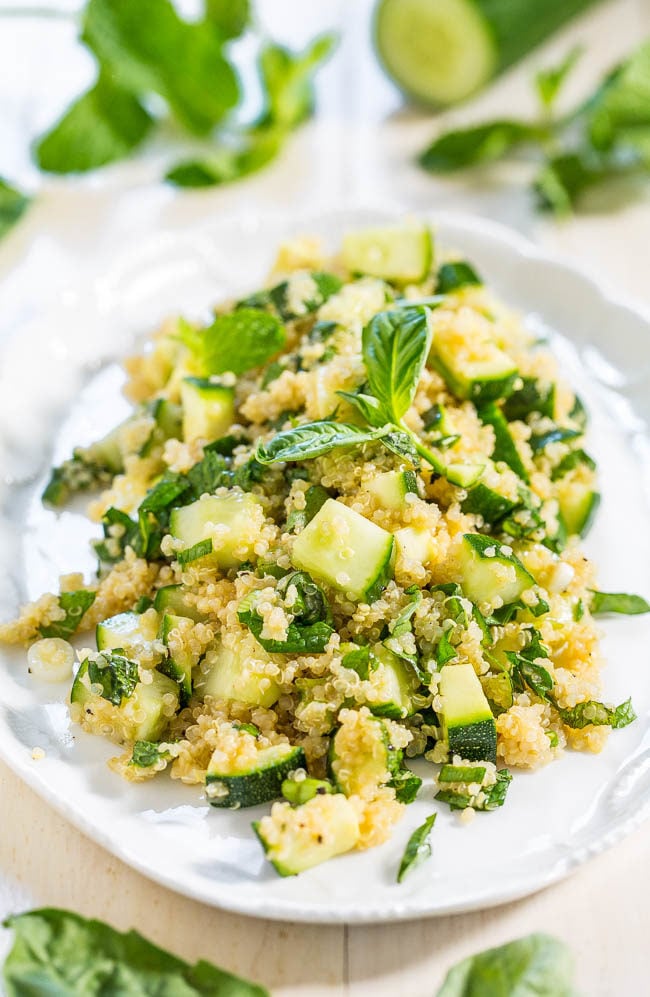 Favorite Greens Quinoa Salad - Cucumber, zucchini, basil, and mint tossed with a sweet-and-tangy honey-lemon vinaigrette! Healthy, easy, ready in 15 minutes, and the best way to eat your greens!!