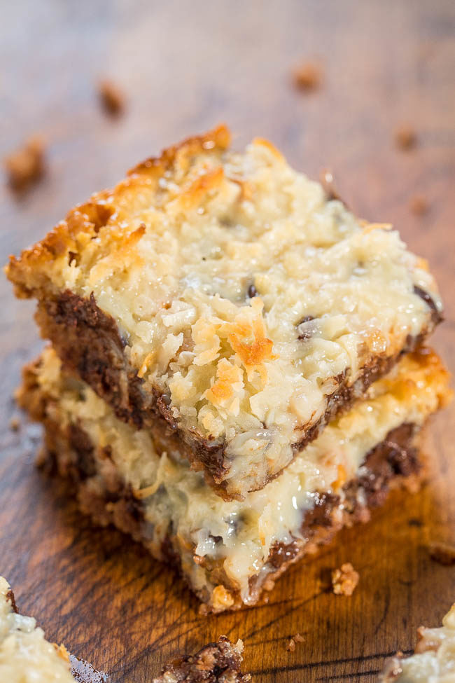 Chocolate Chip Cookie Magic Bars - The classic recipe made even better with a chocolate chip cookie crust!! One bowl, no mixer, fast and easy! Soft, chewy, gooey and SO GOOD!!