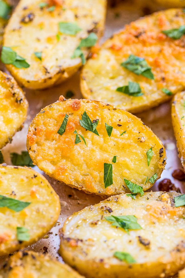 Parmesan and Herb Roasted Potatoes garnished with fresh parsley