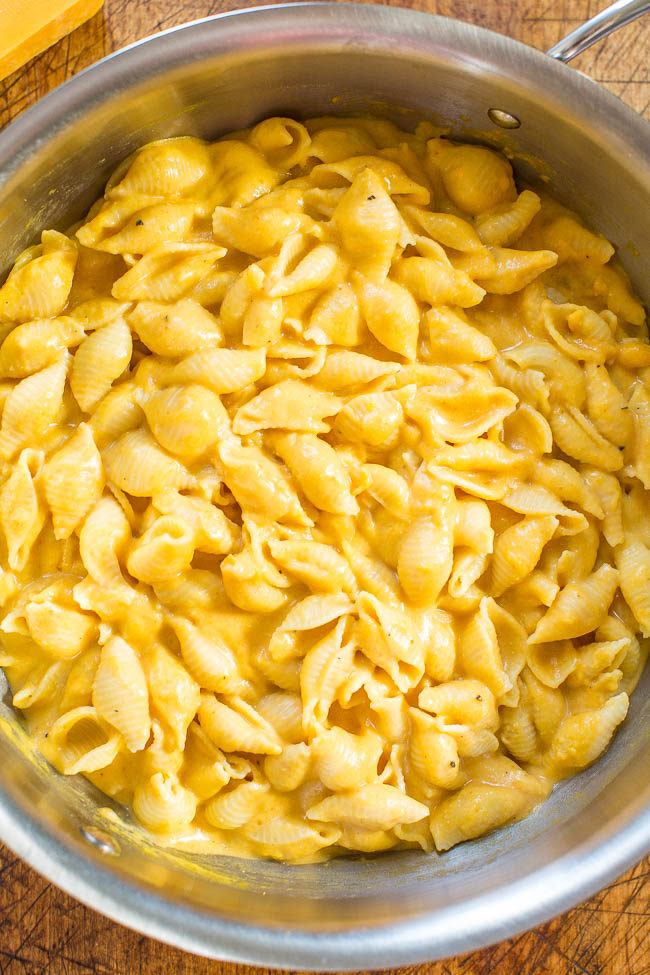 Easy 30-Minute Stovetop Pumpkin Macaroni and Cheese - The pumpkin flavor is subtle compared to the super CHEESY and creamy factor!! The pumpkin boosts the cheesiness to a whole new level everyone loves!!