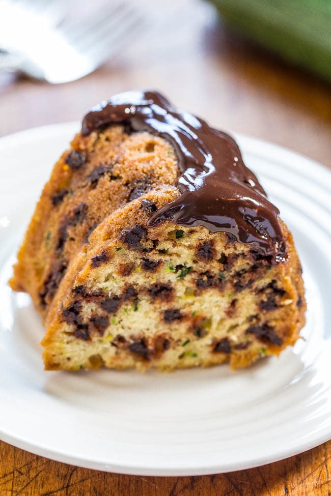 Zucchini Chocolate Chip Bundt Cake with Chocolate Ganache - The best zucchini cake ever!! Soft, moist, and you can't even taste the zucchini! Tastes like a yellow bakery cake drenched in chocolate!!