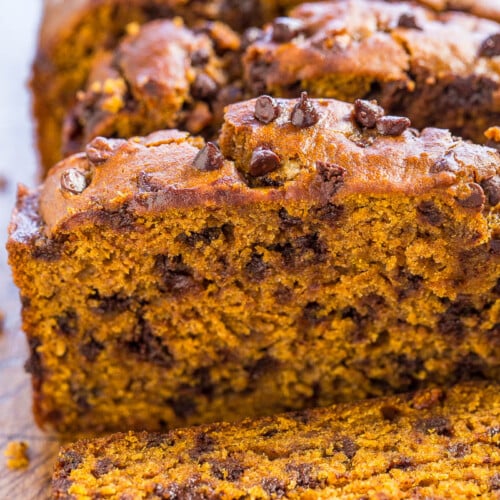 A sliced loaf of chocolate chip pumpkin bread.
