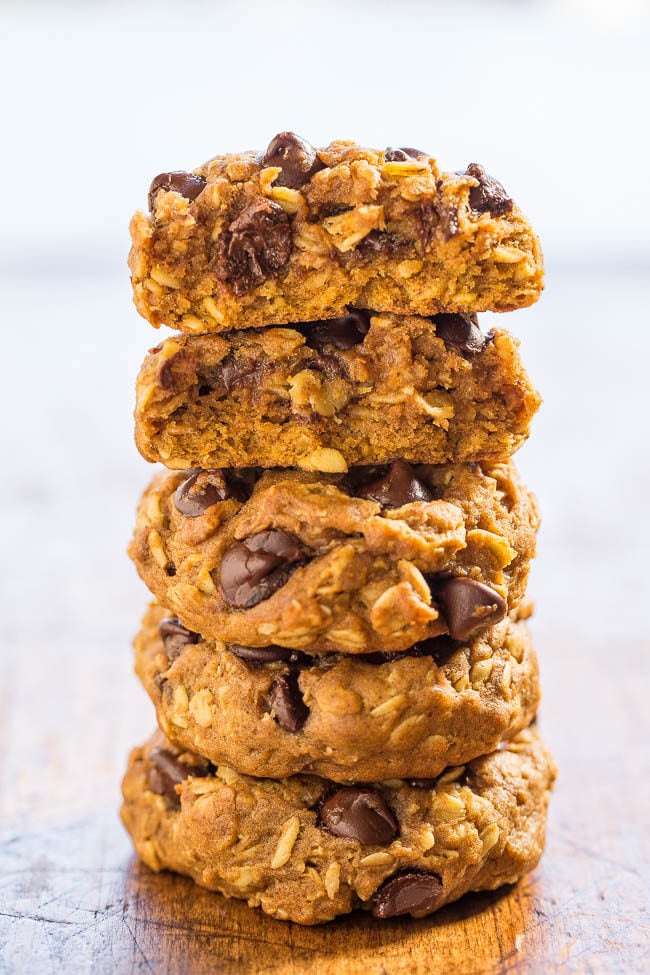 Soft and Chewy Pumpkin Oatmeal Chocolate Chip Cookies - A thick, hearty oatmeal cookie and a soft, chewy pumpkin cookie all in one!! Lots of chocolate, not at all cakey, easy, and your new favorite pumpkin cookie recipe!!