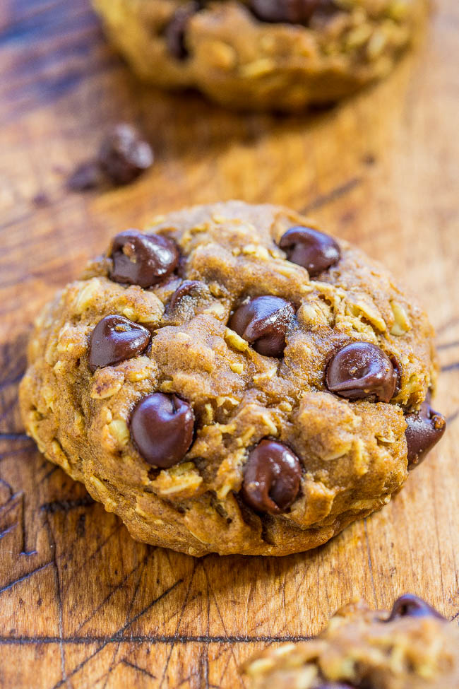 Pumpkin Oatmeal Chocolate Chip Cookies — These pumpkin oatmeal cookies are bursting with chocolate chips in every bite! They're thick, hearty, perfectly chewy, and not at all cakey.