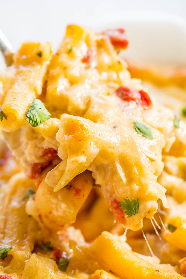Three Cheese Baked Ziti - Mozzarella, fontina, and parmesan melted together are divine!! An easy, make-ahead meal that's also freezer-friendly and so tasty!! The whole family will love it!