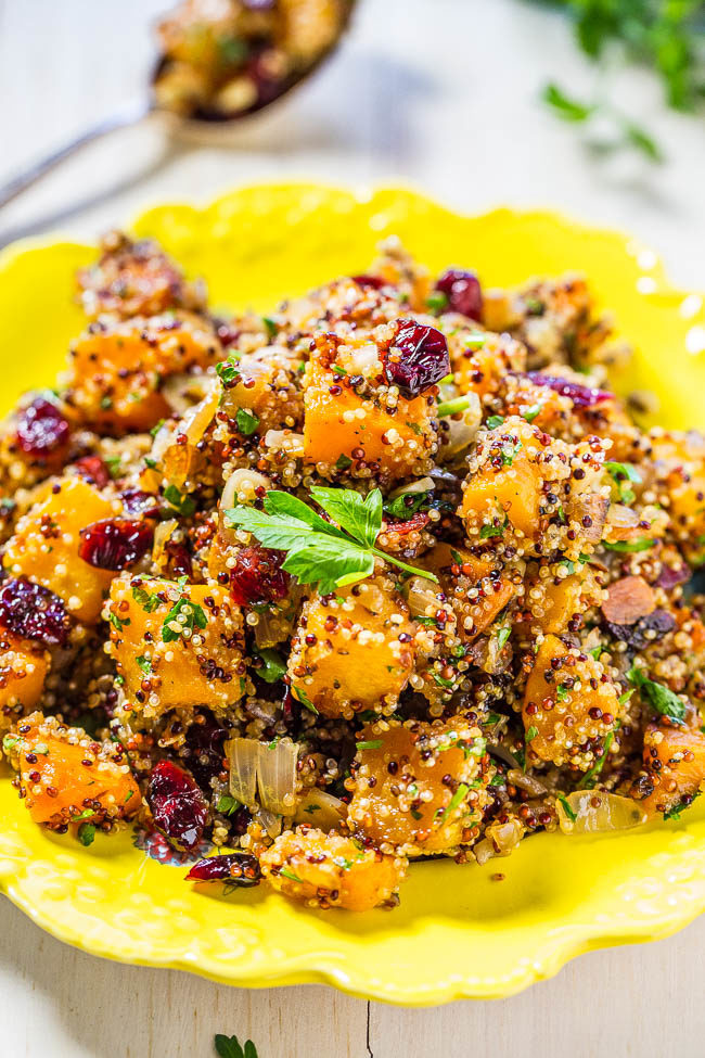 Maple-Roasted Butternut Squash Quinoa Harvest Salad - Easy and packed with big fall flavors!! Maple syrup, squash, and cranberries were made for each other! Love it when healthy tastes so good!!