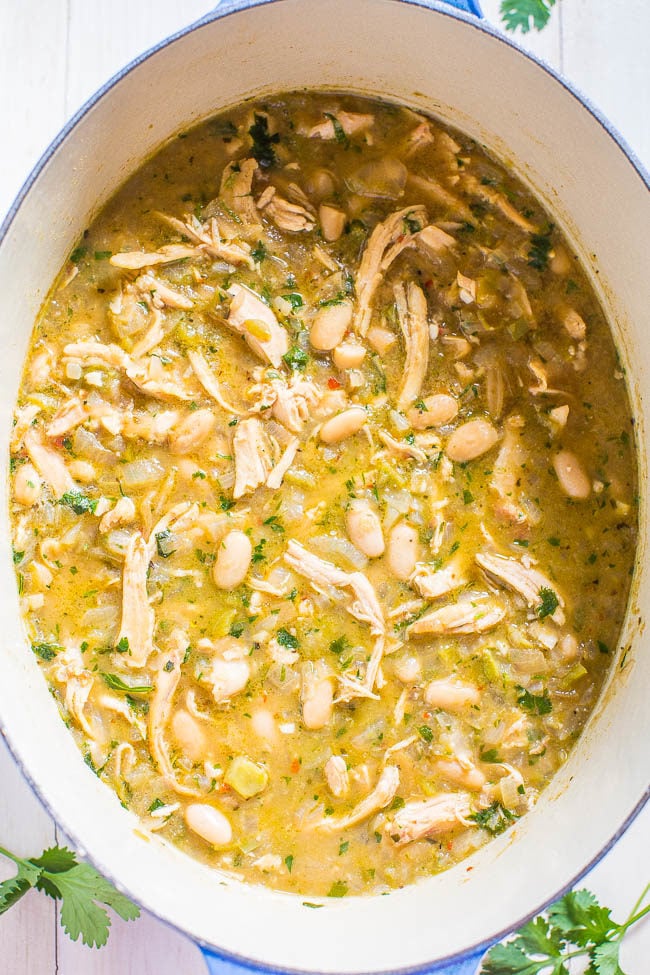 Easy 30-Minute Homemade White Chicken Chili - Hearty, healthy, loaded with tender chicken, and packed with bold flavor!! Fast and easy comfort food that everyone loves!! It'll be on rotation all winter!