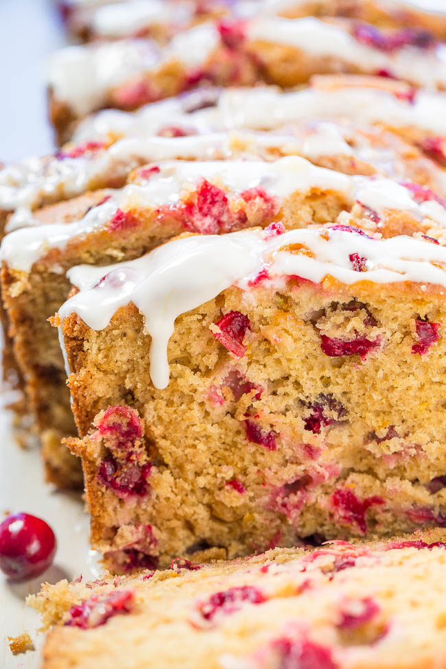 Cranberry Orange Bread with Sweet Orange Glaze - Soft, easy, and loaded with big juicy cranberries!! The sweet orange glaze pairs perfectly with the tart berries and it's so good!!
