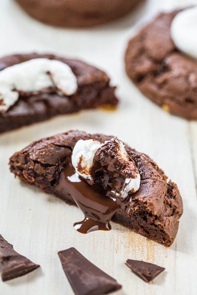 Hot Chocolate Cookies — These gooey hot chocolate cookies are complete with big gooey marshmallows and chunks of melted dark chocolate.