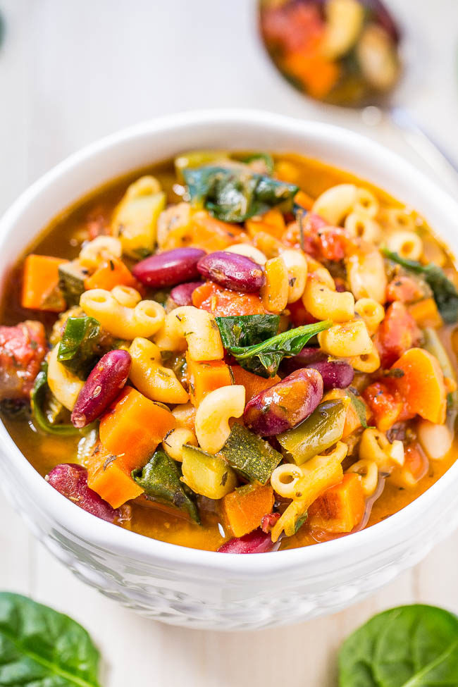 A white bowl filled with Easy 30-Minute Minestrone Soup (Olive Garden Copycat)