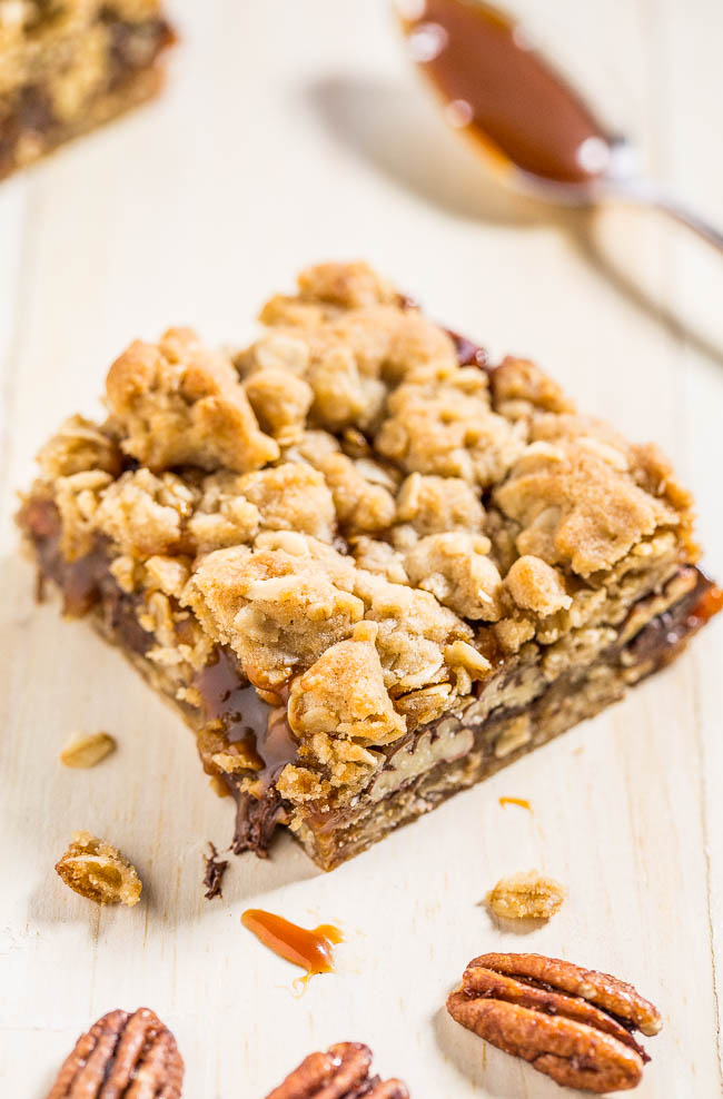 Salted Caramel Pecan Bars — These bars are packed with chocolate, oats, candied pecans, and are dripping with salted caramel! Beyond-words amazing and an absolute must-make!!