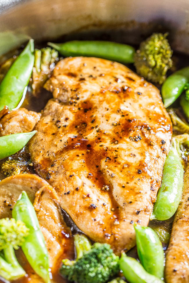 One-Skillet Balsamic Chicken and Vegetables - A tangy-sweet balsamic glaze coats juicy chicken and crisp-tender veggies!! Healthy, easy, ready in 15 minutes, and perfect for busy weeknights! It's a keeper!!