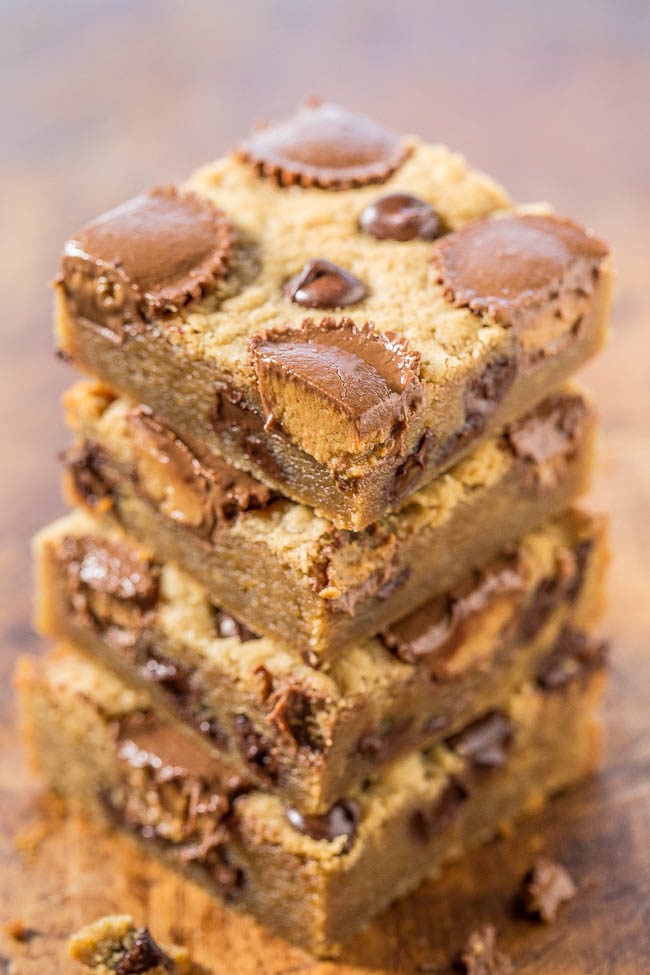Peanut Butter Cup Peanut Butter Bars - Loaded with peanut butter, peanut butter cups and chocolate!! Soft, gooey and totally irresistible! Everything's better with peanut butter cups!!